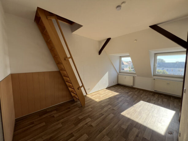 Wohnzimmer  mit Zugang zur Galerie